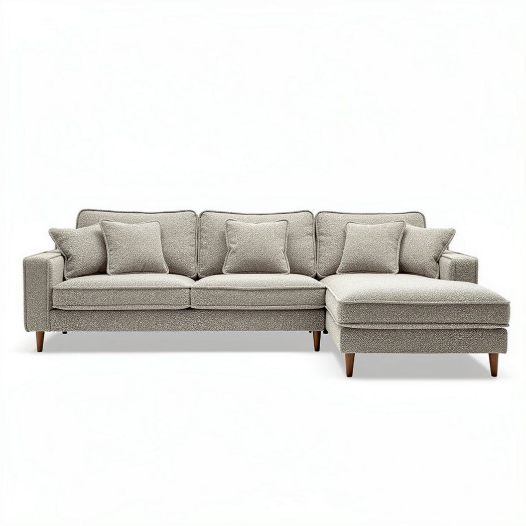 L-shaped sectional sofa with plush fabric upholstery and wooden legs